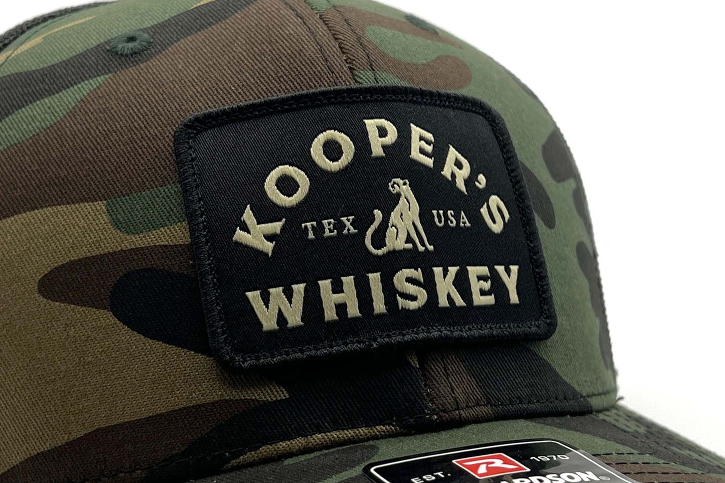 Kooper Family Whiskey Trucker Hat - Camouflage